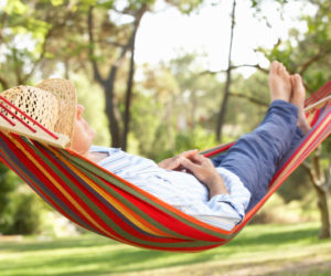 Senior Man Relaxing In Hammock