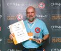 Werner Braga recebeu o trofÃ©u e os certificados em nome da Itaipu | Foto: DivulgaÃ§Ã£o/Childhood Brasil